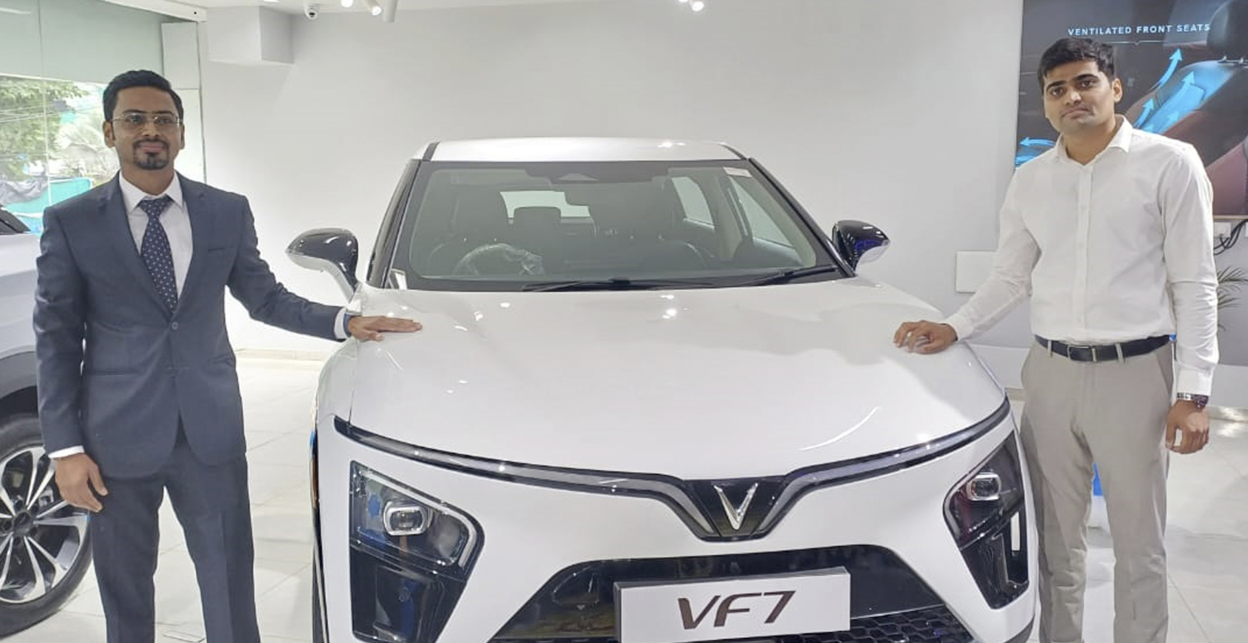(L-R) Arunoday Das, Deputy CEO, Vinfast India & Akshay Jain, Director, Nanesh Automotives Pvt. Ltd.; with the premium electric SUV VF7; at the unveiling of the first showroom of Vinfast - the electric vehicle arm of Vingroup JSC, Vietnam’s largest conglomerate & a global leader in affordable EVs; in the Telugu states, in collaboration with Nanesh Automotives Pvt. Ltd., at a Press Conference at Gachibowli, today.