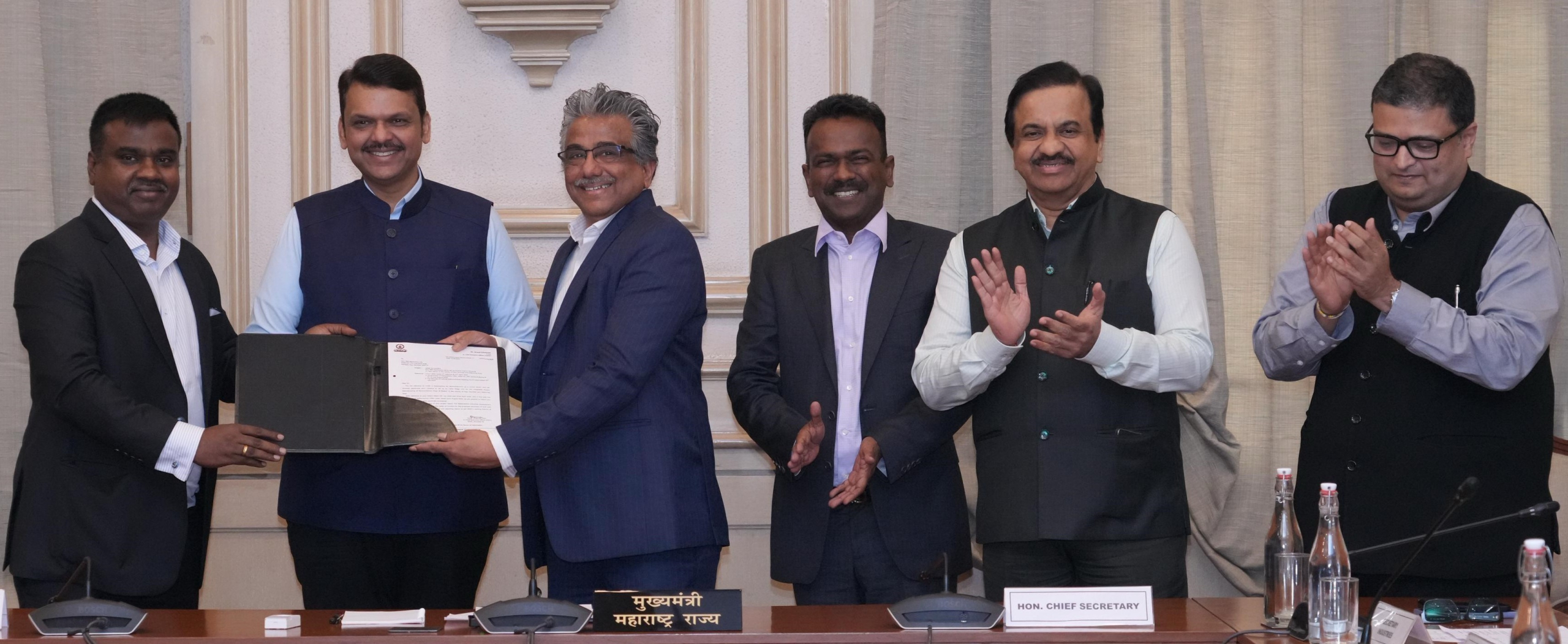 Maharashtra CM Devendra Fadnavis presenting Letter of Comfort for 100 acres to Rajendra Chodankar, Chairman, RRP Electronics